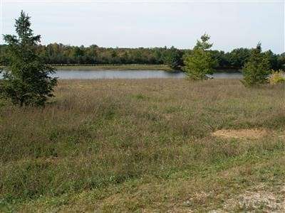0.69 Acres of Residential Land for Sale in Canadian Lakes, Michigan