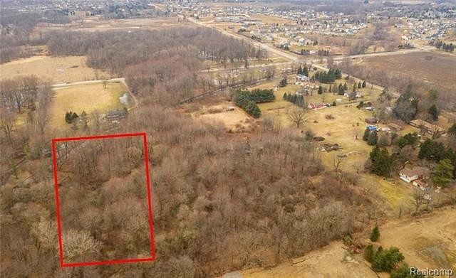 5 Acres of Residential Land for Sale in South Lyon, Michigan