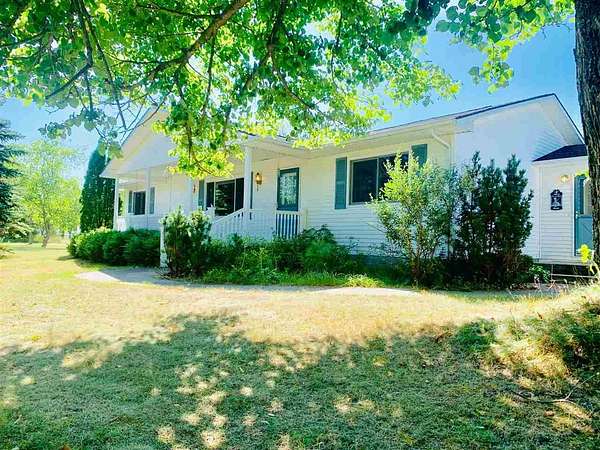 10 Acres of Land with Home for Sale in Mancelona, Michigan