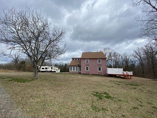 10.7 Acres of Land with Home for Sale in London, Arkansas