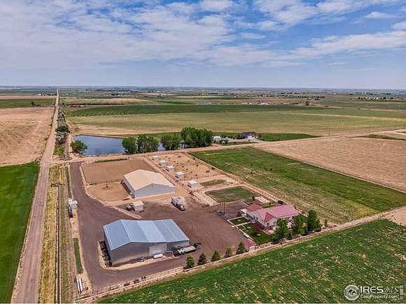 7.73 Acres of Residential Land with Home for Sale in Keenesburg, Colorado