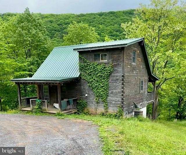14 Acres of Recreational Land with Home for Sale in Cabins, West Virginia
