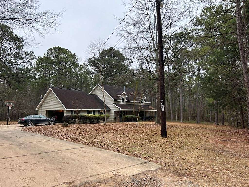 4.9 Acres of Residential Land with Home for Sale in Smiths Station, Alabama