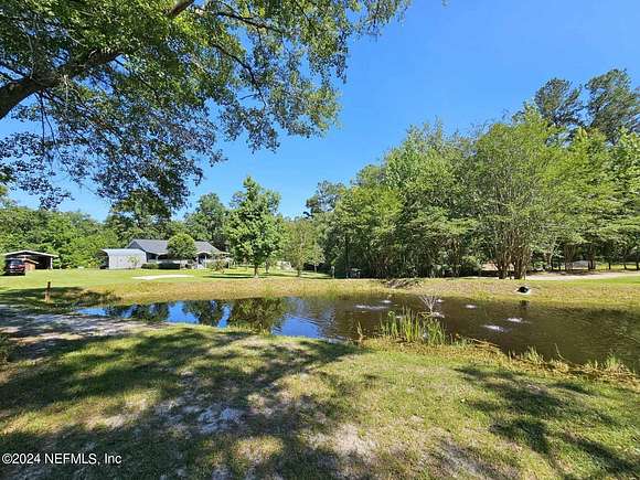 5.9 Acres of Residential Land with Home for Sale in Hilliard, Florida