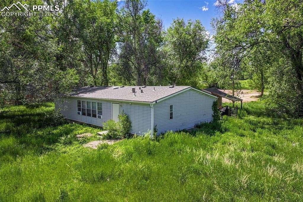 4.59 Acres of Residential Land with Home for Sale in Colorado Springs, Colorado