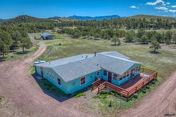 5.1 Acres of Land with Home for Sale in Cotopaxi, Colorado