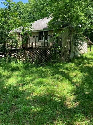7 Acres of Land with Home for Sale in Mansfield, Missouri