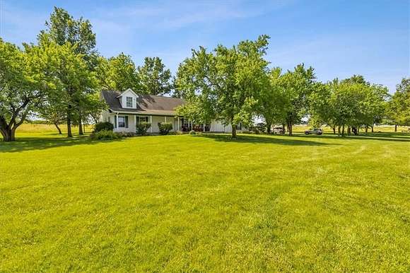 46 Acres of Recreational Land with Home for Sale in Harrisonville, Missouri