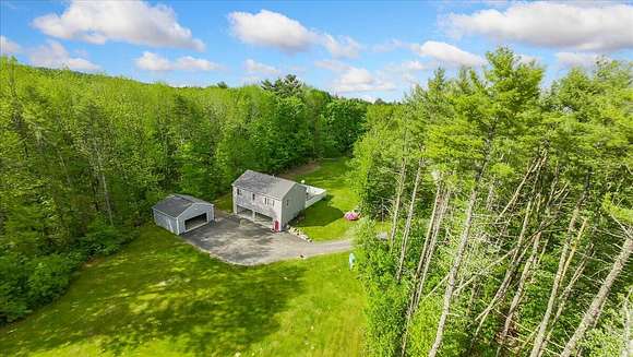8.7 Acres of Residential Land with Home for Sale in Raymond, Maine
