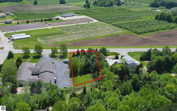 0.74 Acres of Commercial Land for Sale in Williamsburg, Michigan