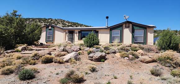 100 Acres of Recreational Land with Home for Sale in Kingman, Arizona