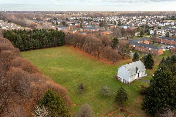 5.2 Acres of Residential Land with Home for Sale in Webster, New York