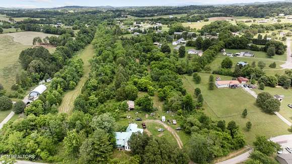4.02 Acres of Residential Land with Home for Sale in Madisonville, Tennessee