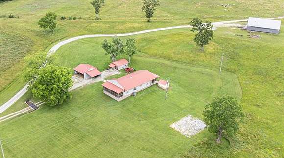 6.34 Acres of Land with Home for Sale in Wesley, Arkansas