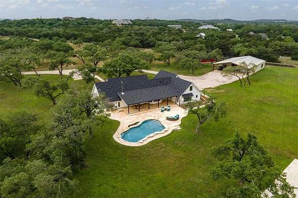 12.8 Acres of Land with Home for Sale in Dripping Springs, Texas