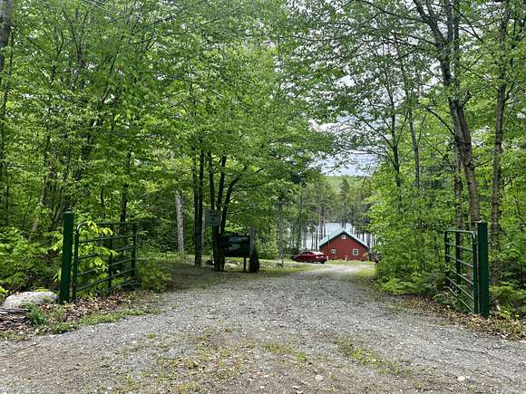 12.8 Acres of Land with Home for Sale in Lakeville Town, Maine