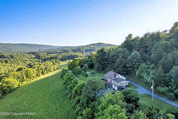 10.9 Acres of Land with Home for Sale in Saylorsburg, Pennsylvania
