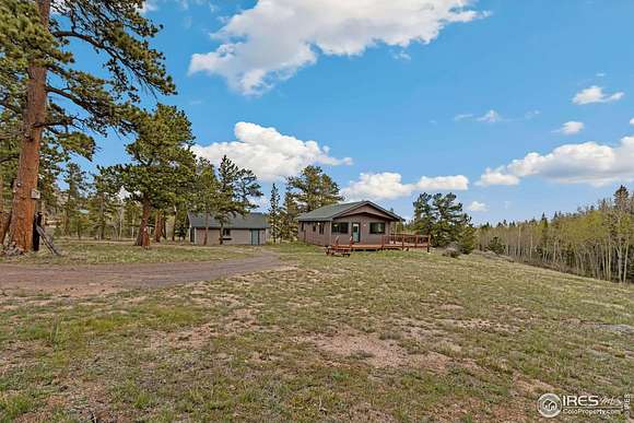2.5 Acres of Residential Land with Home for Sale in Red Feather Lakes, Colorado