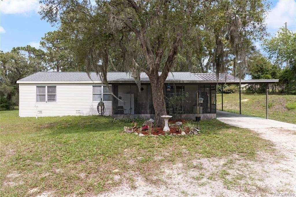 2.2 Acres of Residential Land with Home for Sale in Lecanto, Florida