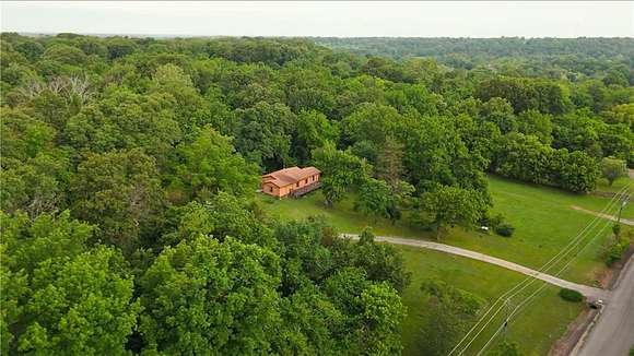 3.2 Acres of Residential Land with Home for Sale in Springdale, Arkansas