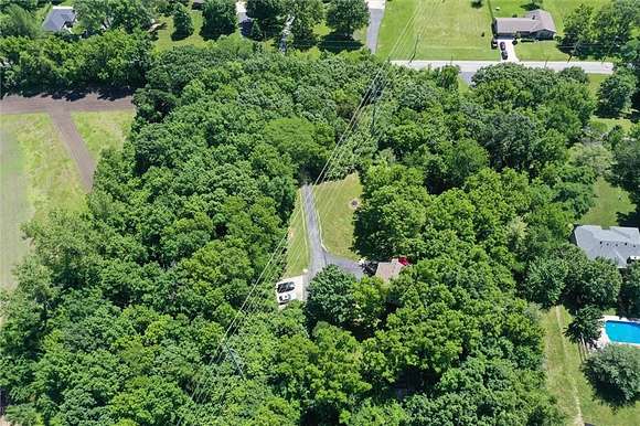 4.96 Acres of Residential Land with Home for Sale in Independence, Missouri