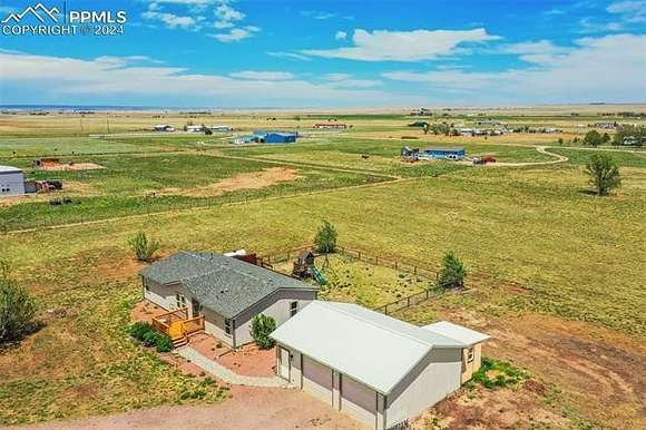 5 Acres of Residential Land with Home for Sale in Calhan, Colorado
