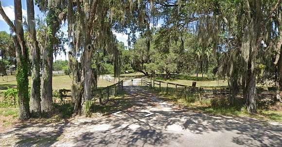 9.9 Acres of Residential Land with Home for Sale in Lithia, Florida