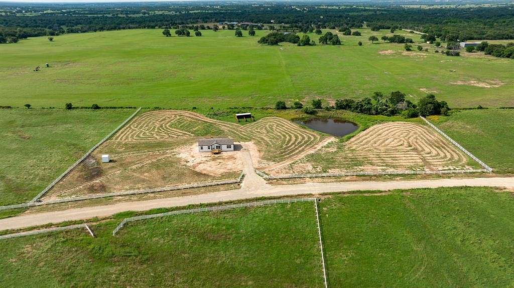 4.9 Acres of Residential Land with Home for Sale in Lipan, Texas