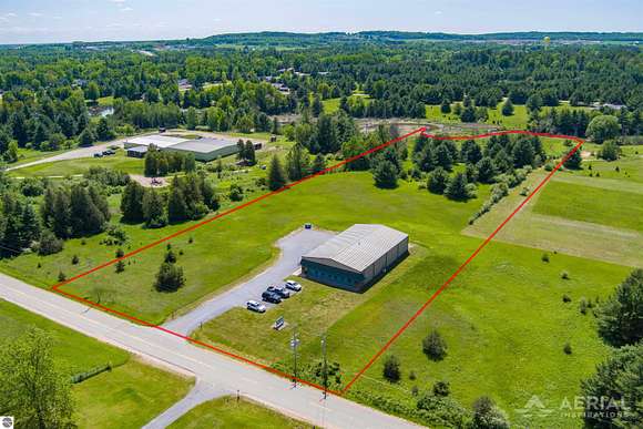 7.3 Acres of Improved Commercial Land for Sale in West Branch, Michigan