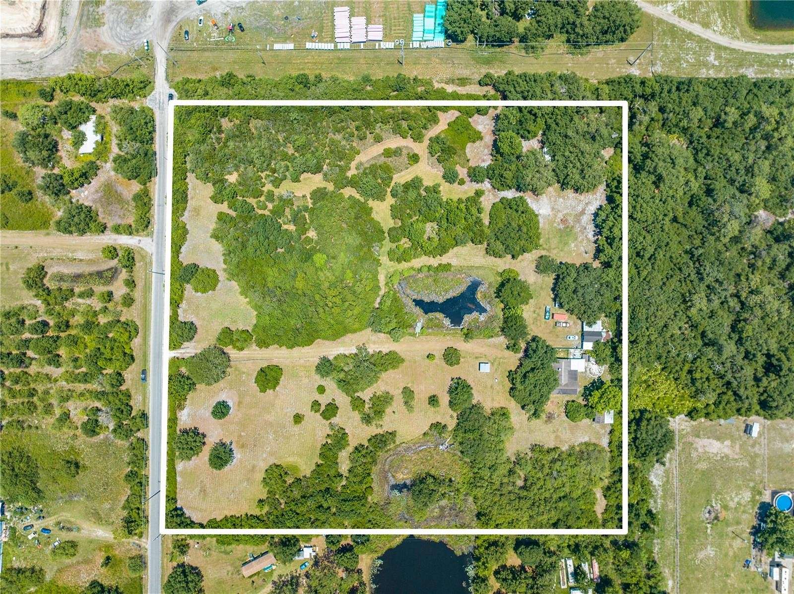 10 Acres of Residential Land with Home for Sale in St. Cloud, Florida