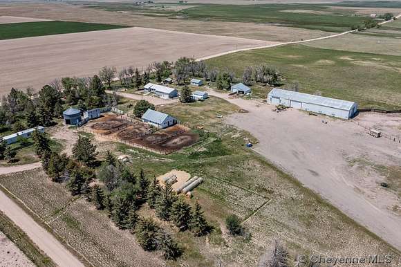 58 Acres of Agricultural Land with Home for Sale in Pine Bluffs, Wyoming
