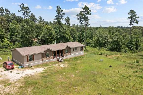 7.076 Acres of Residential Land with Home for Sale in Lufkin, Texas