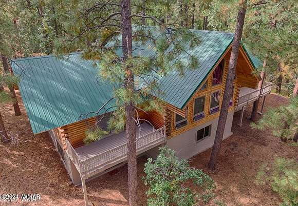 2.5 Acres of Residential Land with Home for Sale in Pinetop, Arizona