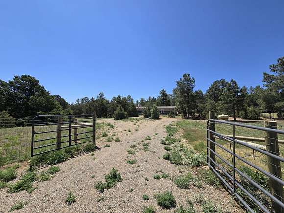 2.5 Acres of Residential Land with Home for Sale in Tijeras, New Mexico