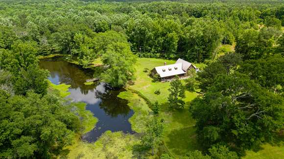 13.5 Acres of Recreational Land with Home for Sale in Louin, Mississippi