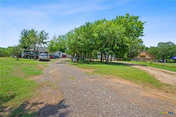 2.2 Acres of Residential Land with Home for Sale in Cedar Creek, Texas