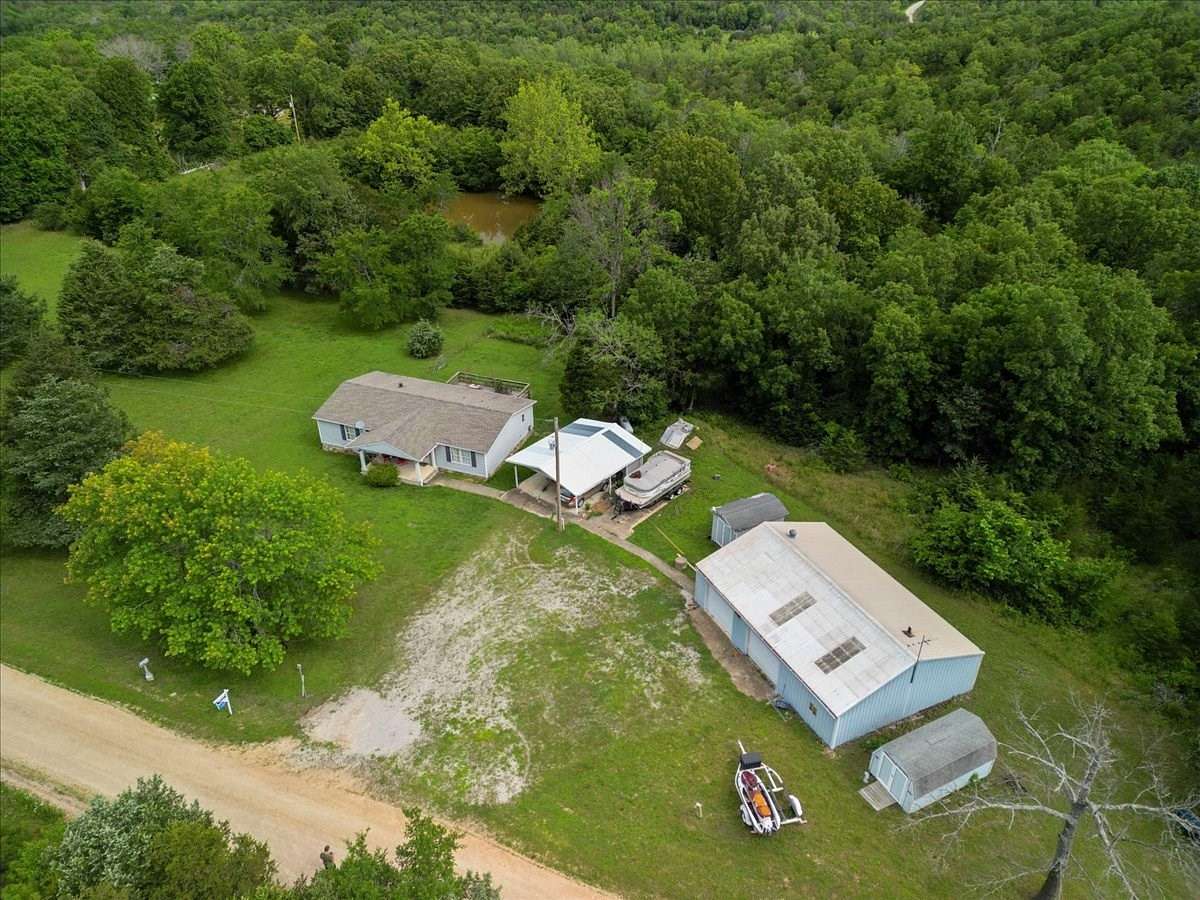 9.95 Acres of Land with Home for Sale in Theodosia, Missouri