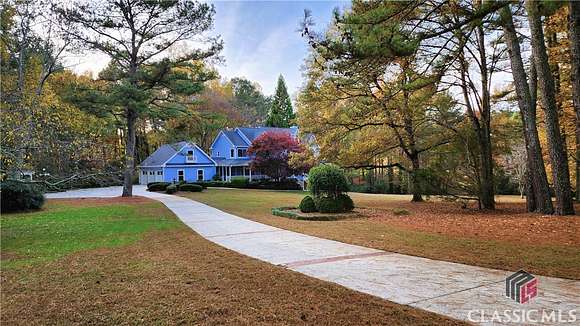 10.34 Acres of Land with Home for Sale in Loganville, Georgia