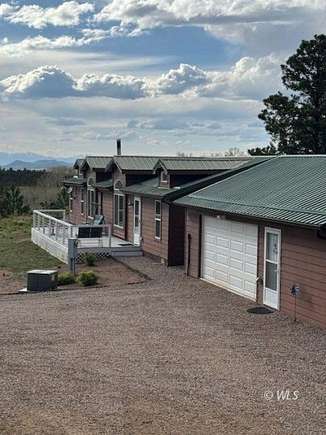 76.4 Acres of Land with Home for Sale in Westcliffe, Colorado