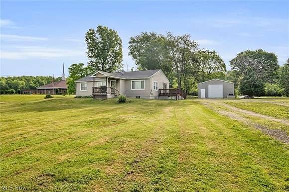 5.3 Acres of Residential Land with Home for Sale in New Franklin, Ohio