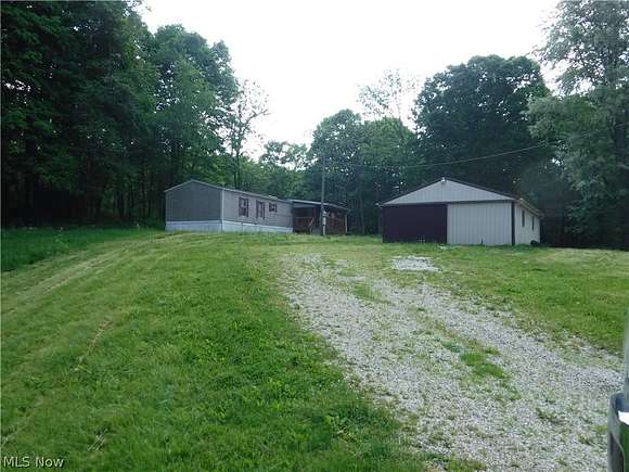 10.1 Acres of Recreational Land with Home for Sale in Kimbolton, Ohio