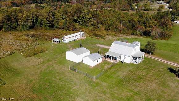 23.6 Acres of Agricultural Land with Home for Sale in Guysville, Ohio