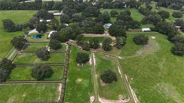 47.4 Acres of Agricultural Land with Home for Sale in Reddick, Florida
