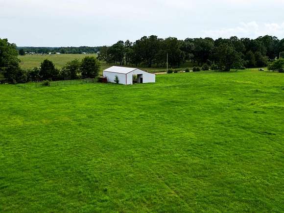 15.1 Acres of Agricultural Land for Sale in Rocky Comfort, Missouri