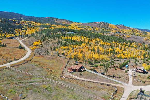 5.1 Acres of Residential Land with Home for Sale in Granby, Colorado