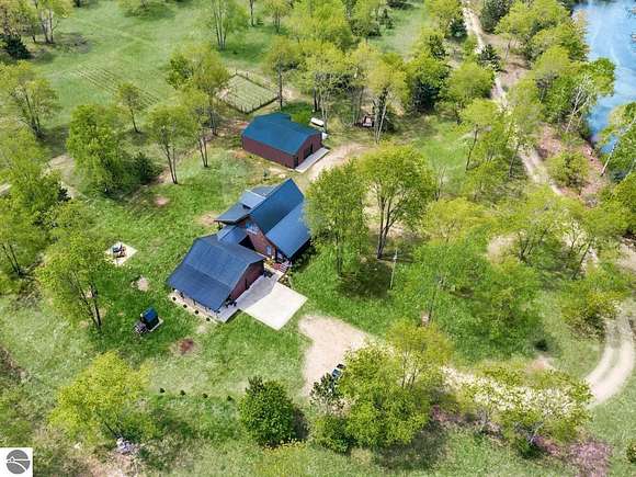 34.4 Acres of Recreational Land with Home for Sale in Thompsonville, Michigan