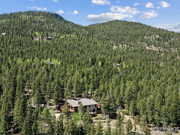2.2 Acres of Residential Land with Home for Sale in Estes Park, Colorado