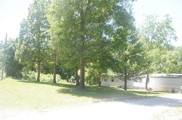 3.1 Acres of Residential Land with Home for Sale in Holts Summit, Missouri