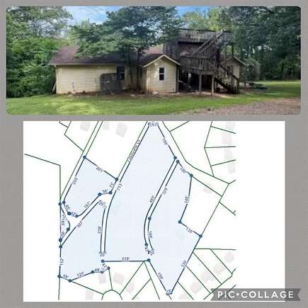 7.9 Acres of Residential Land with Home for Sale in Mableton, Georgia