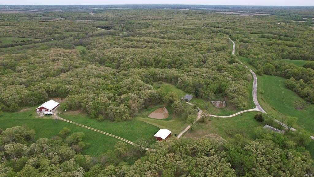 223 Acres of Land with Home for Sale in Novinger, Missouri